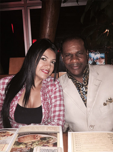 A client spending time with a South American woman during the romance tours