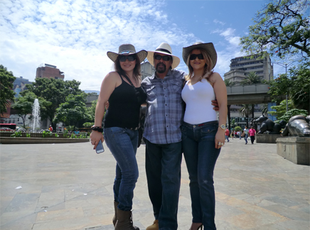 A happy client socializing with beautiful Latin women